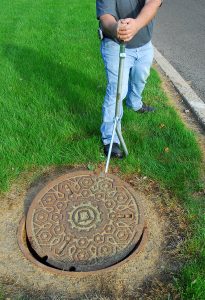 Manhole Cover Lifter in use